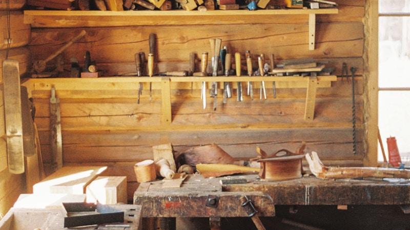 A workbench covered in many tools that all need upkeep